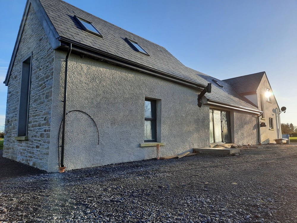 Harling coat using traditional lime plaster